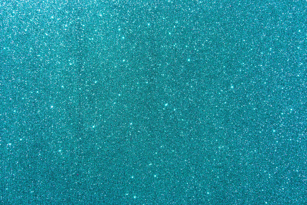 Background with sparkles. Backdrop with glitter. Shiny textured surface. Dark cyan. Soft light - Valokuva, kuva