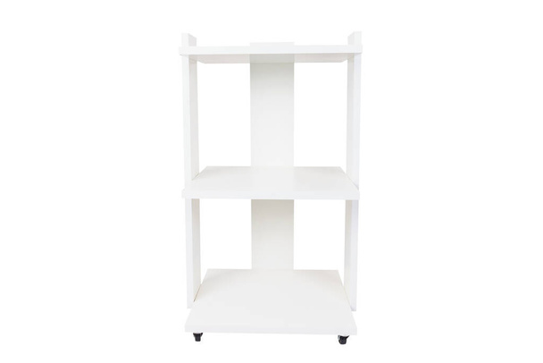 Cabinet or rack on wheels with shelves on a white isolated background. White chipboard. - Photo, Image
