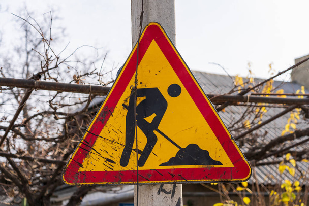 Road sign repair work. Background with selective focus and copy space for text - Foto, immagini