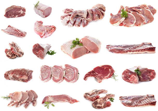 pork meats in front of white background - Foto, imagen