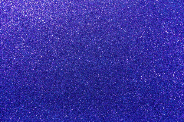 Background with sparkles. Backdrop with glitter. Shiny textured surface. Very dark blue. Soft light - Valokuva, kuva