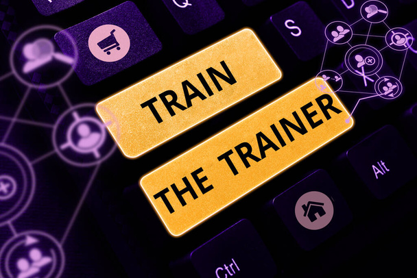 Texto que presenta Train The Trainer, Concepto de negocio identificado para enseñar mentor o entrenar a otros que asisten a clase - Foto, Imagen