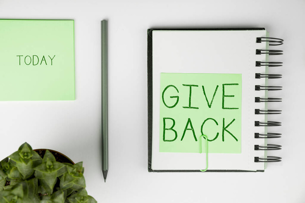 Tekenen weergeven Give Back, Internet Concept de handeling van het geven van iemand iets dat ze bezat of eerder had - Foto, afbeelding