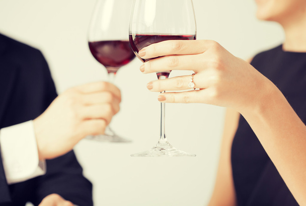 engaged couple with wine glasses - 写真・画像