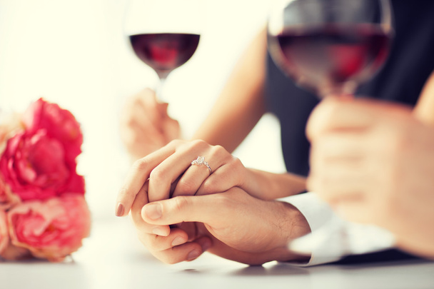engaged couple with wine glasses - Foto, imagen