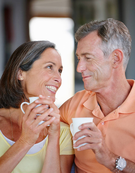 Bliss is being with you. a loving mature couple having coffee together at home - Photo, Image