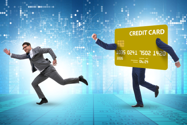 クレジットカードの負債の概念のビジネスマン - 写真・画像