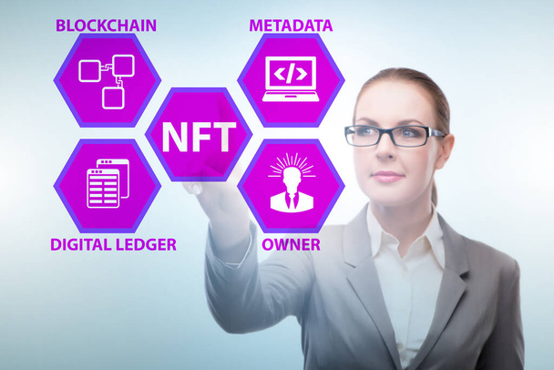 Businesswoman in the NFT non fungible concept - Photo, Image