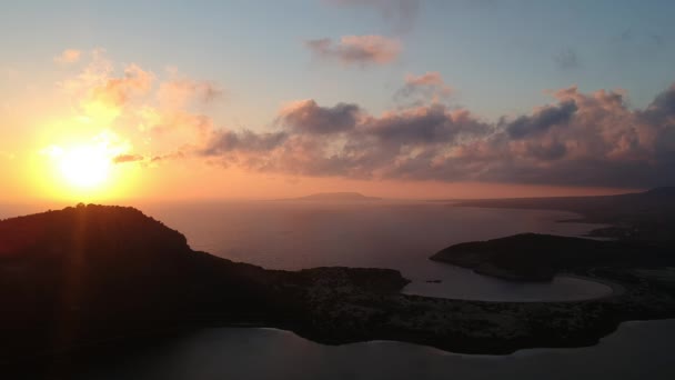 Panoramic aerial view of voidokilia beach, one of the best beaches in Europe. Beautiful lagoon of Voidokilia from a high point of view at sunset in Messinia, Greece, Europe. - Footage, Video