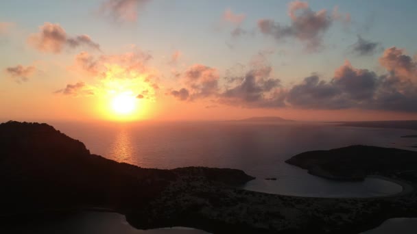 Panoramic aerial view of voidokilia beach, one of the best beaches in Europe. Beautiful lagoon of Voidokilia from a high point of view at sunset in Messinia, Greece, Europe. - Footage, Video