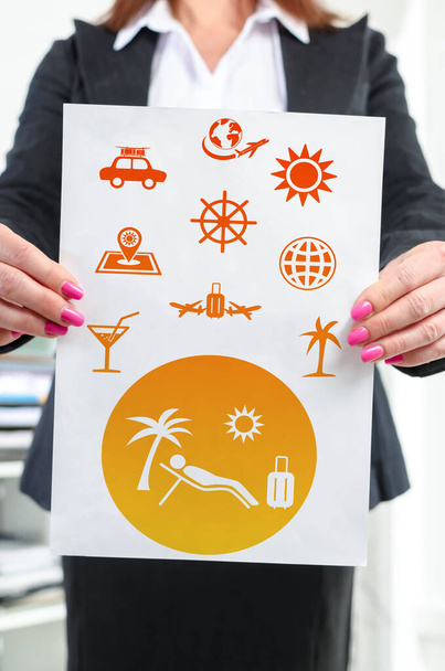 Paper with vacation concept held by a businesswoman - Photo, Image