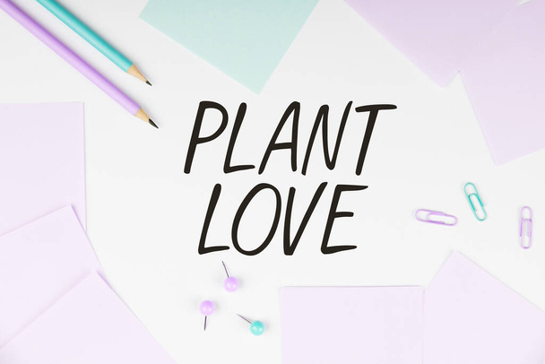 Szöveg felirat bemutató Plant Love, Üzleti ötlet szimbóluma érzelmi szeretet, gondozás és támogatás megmutatta másoknak - Fotó, kép