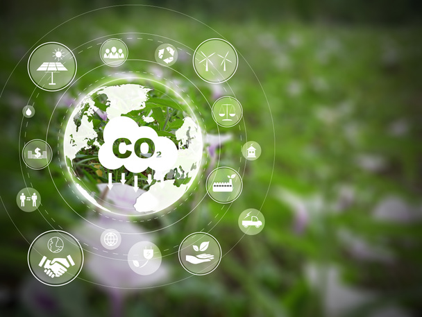 Сокращение выбросов CO2 концепция с освежающим зеленым полем в фоновом режиме. Многие иконки на помощь уменьшить углекислый газ в воздухе.  - Фото, изображение
