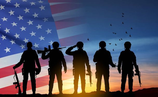 Silhouette of army soldier with USA flag. Greeting card for Veterans Day, Memorial Day, Independence Day. Armed Force concept. EPS10 vector - Wektor, obraz