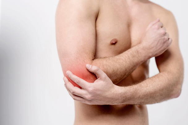 Man with pain in elbow joint - Valokuva, kuva