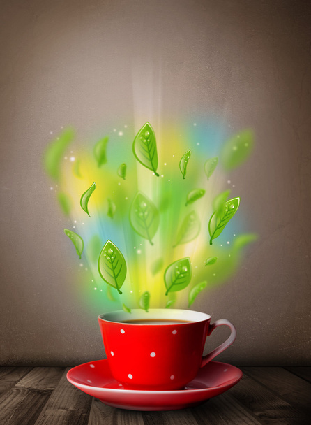 Tea cup with leaves and colorful abstract lights - Foto, immagini