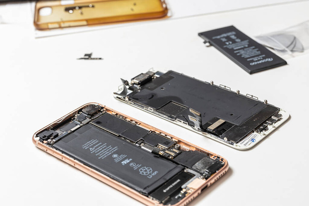 Smartphone battery replacement, repair, LCD panel replacement - Photo, image