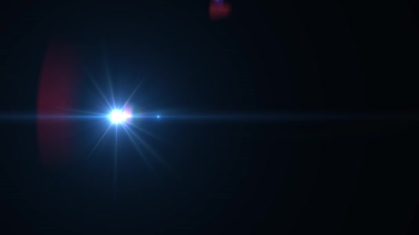 Modrá čočka světélkuje světlo prosakující v tmavém pozadí. Grafická textura pohybu - Záběry, video