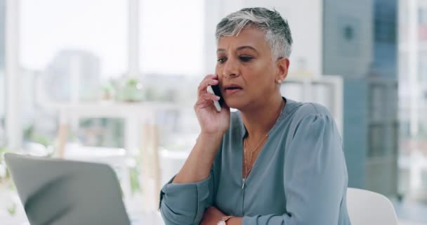 Senior business woman, phone call and laptop in office for online collaboration, web conversation and concern planning strategy. Mature worker, tech error and corporate leader talking smartphone app. - Filmmaterial, Video