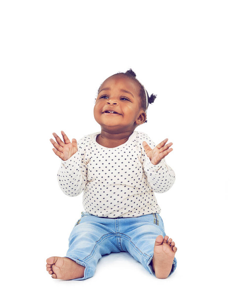 If youre happy and you know it clap your hands. Studio shot of a happy baby girl isolated on white - Foto, afbeelding