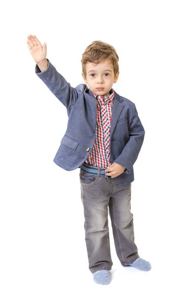 маленький хлопчик з піднятою рукою на білому
  - Фото, зображення