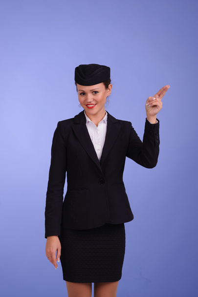 Portrait of woman stewardess - Foto, afbeelding