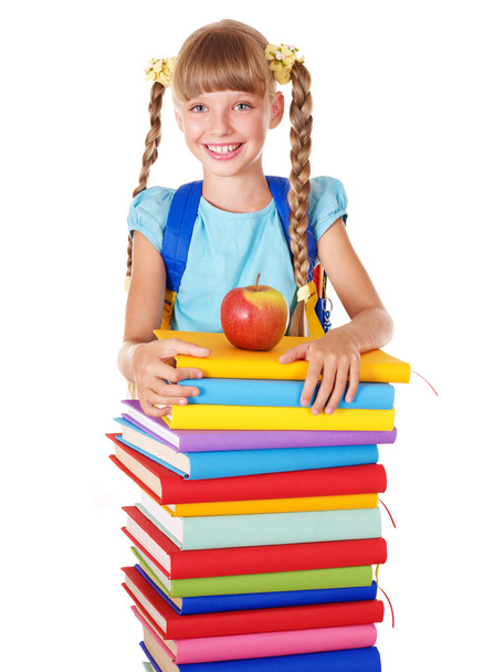 Schoolgirl with backpack holding pile of books. - Foto, afbeelding
