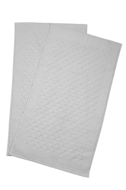 Weißes Badefußtuch aus 100% Baumwolle Frottee-Handtücher isoliert mit weißem Hintergrund. Badaccessoires. Ansicht von oben. - Foto, Bild