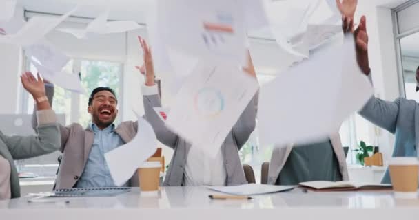 Business people, throwing paper or success meeting in winner finance planning, company growth goals or target motivation. Happy smile, flying documents or excited financial teamwork in diversity kpi. - Video, Çekim