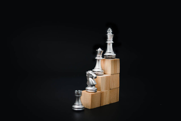 development and improvement in corporate growth and professional Success idea concept of business leader or entrepreneur.Chess on wood cube. - Foto, imagen