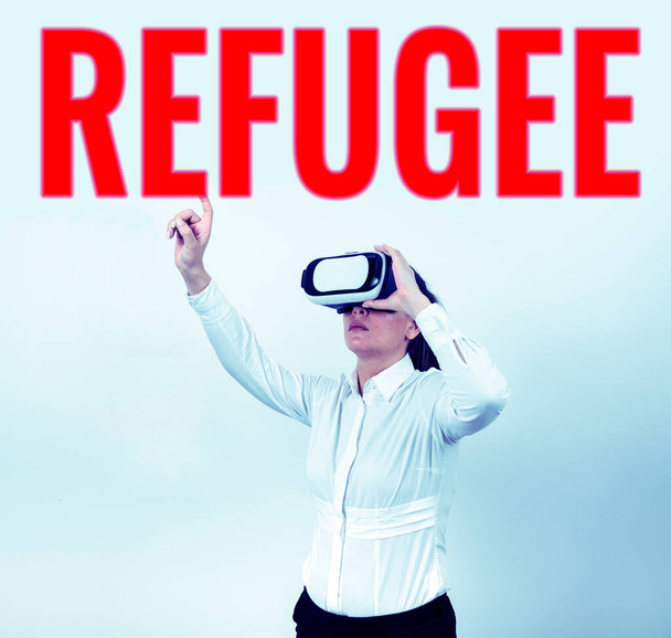 Inspiration showing sign Refugee, Concept meaning refer to movements of large groups of displaced people - Photo, Image