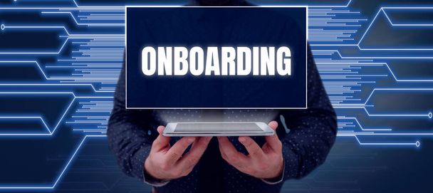Conceptuele weergave Onboarding, Business concept Actie Proces van de integratie van een nieuwe werknemer in een organisatie - Foto, afbeelding