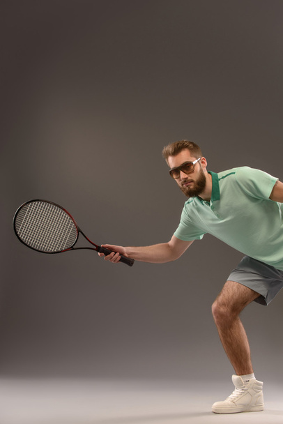 Young man  playing tennis - Φωτογραφία, εικόνα