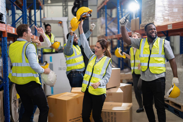 Diversity group of labor union in warehouse celebrate success after won protest salary increment - Photo, Image
