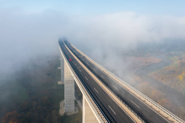 Aerial view about the famous Viaduct of Koroshegy covered by fog, near lake Balaton. - Fotografie, Obrázek