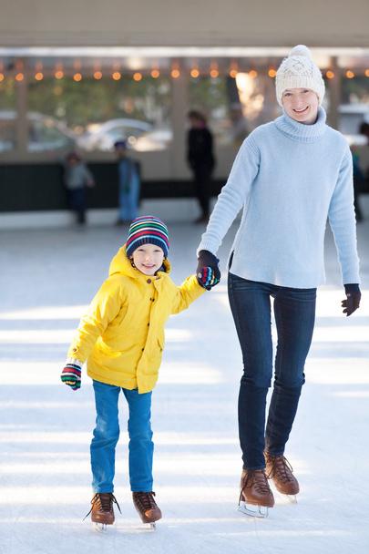 family ice skating - Fotó, kép