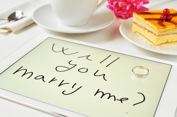 Will you marry me written in a tablet computer - Photo, Image