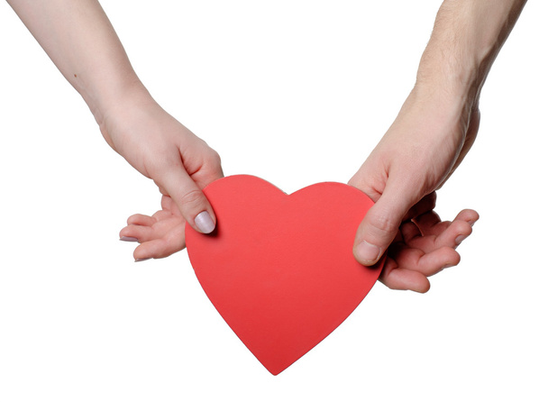 Red heart in woman and man hands - Photo, Image