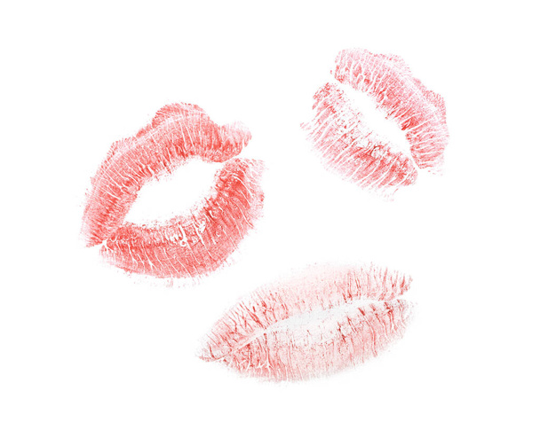 Red lipstick kiss marks on white background - Photo, Image