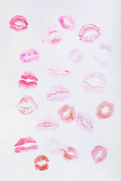 Lipstick kiss marks on white background - Photo, Image