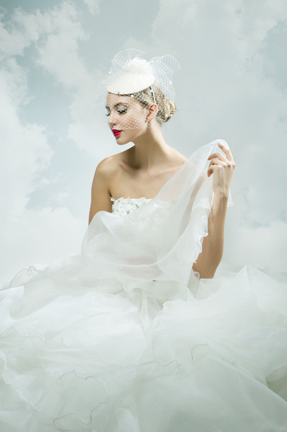 Bride over the sky background. Vintage style. - Foto, immagini