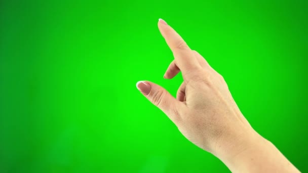 Finger flipping green female hand touch gestures on green screen, 4k prores footage female Green Screen, Mock up, Alpha Channel, Chroma Key, Watching Video Content, Blogging. - Felvétel, videó