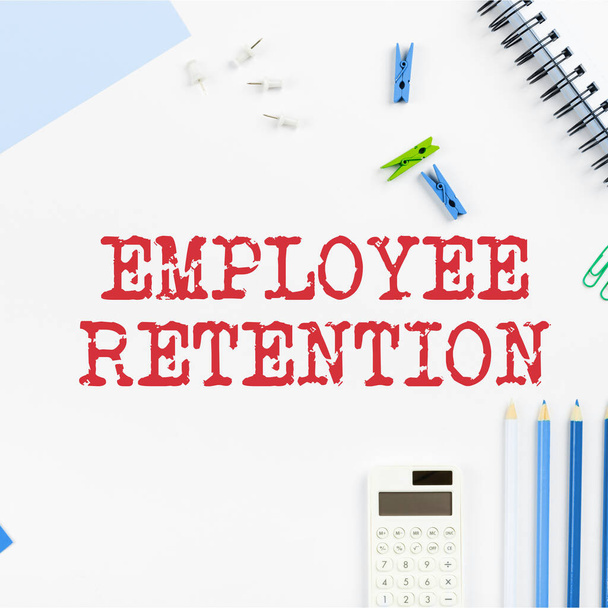 Hand writing sign Employee Retention, Business approach internal recruitment method employed by organizations - Photo, image