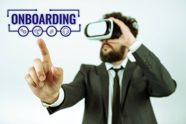 Signo de texto que muestra Onboarding, enfoque empresarial Proceso de integración de un nuevo empleado en una organización - Foto, Imagen