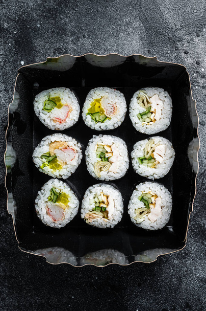 Kimbap or gimbap korean rice roll, Korean sushi. Black background. Top view. - Fotó, kép