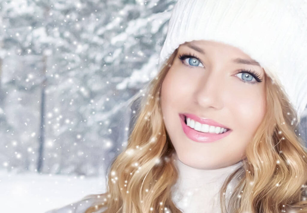 Winter holiday travel, lifestyle and fashion, beautiful happy woman and snowy forest, nature, ski resort and leisure activity outdoors Christmas, New Year and holidays portrait. - Photo, Image