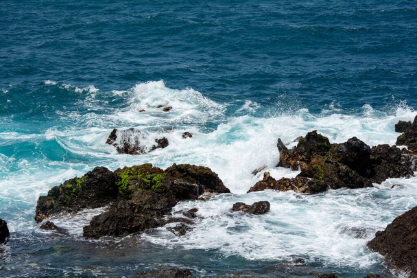 Rocks in the breakers on the coast of the Canary Island of Tenerife, Spain - Fotografie, Obrázek