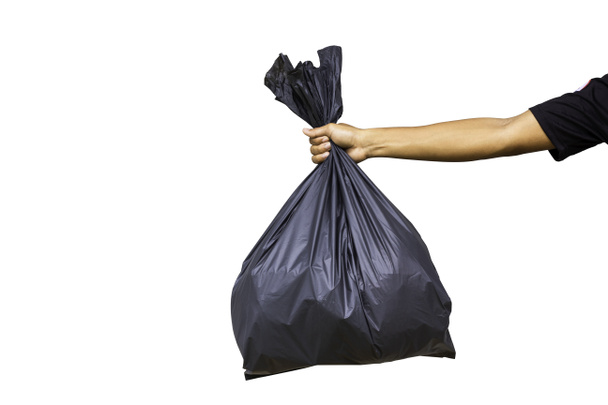 black garbage bag isolated on white background. Handheld Black Garbage Bag - Foto, immagini