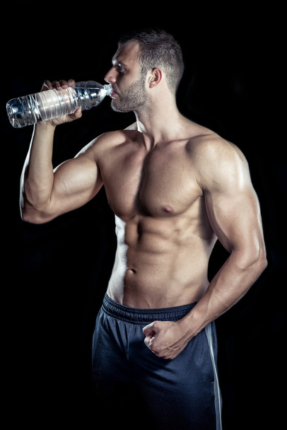 Drinking water in gym - Fotoğraf, Görsel
