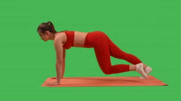woman doing Mountain Climber exercise workout for core strength on mat fitness Isolated on Green Screen background - Záběry, video